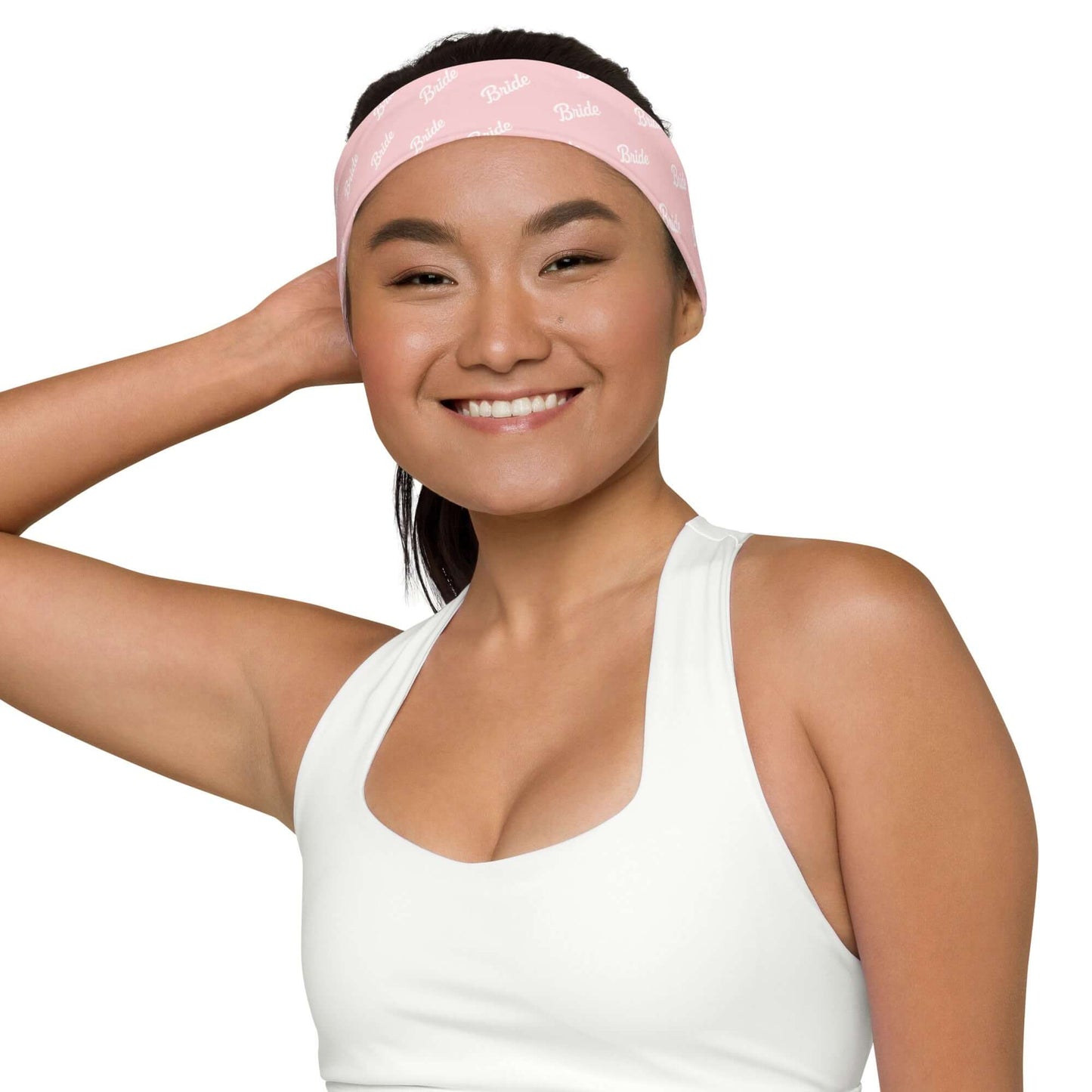 Fascia per capelli rosa con la scritta 'Bride', ideale per attività sportive e momenti di relax pre-matrimoniali.