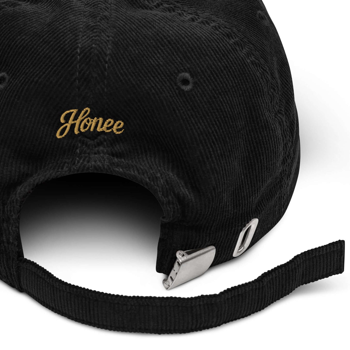 Cappellino ricamato in velluto a coste con scritta 'Honée' sul retro, ideale per look casual e chic.