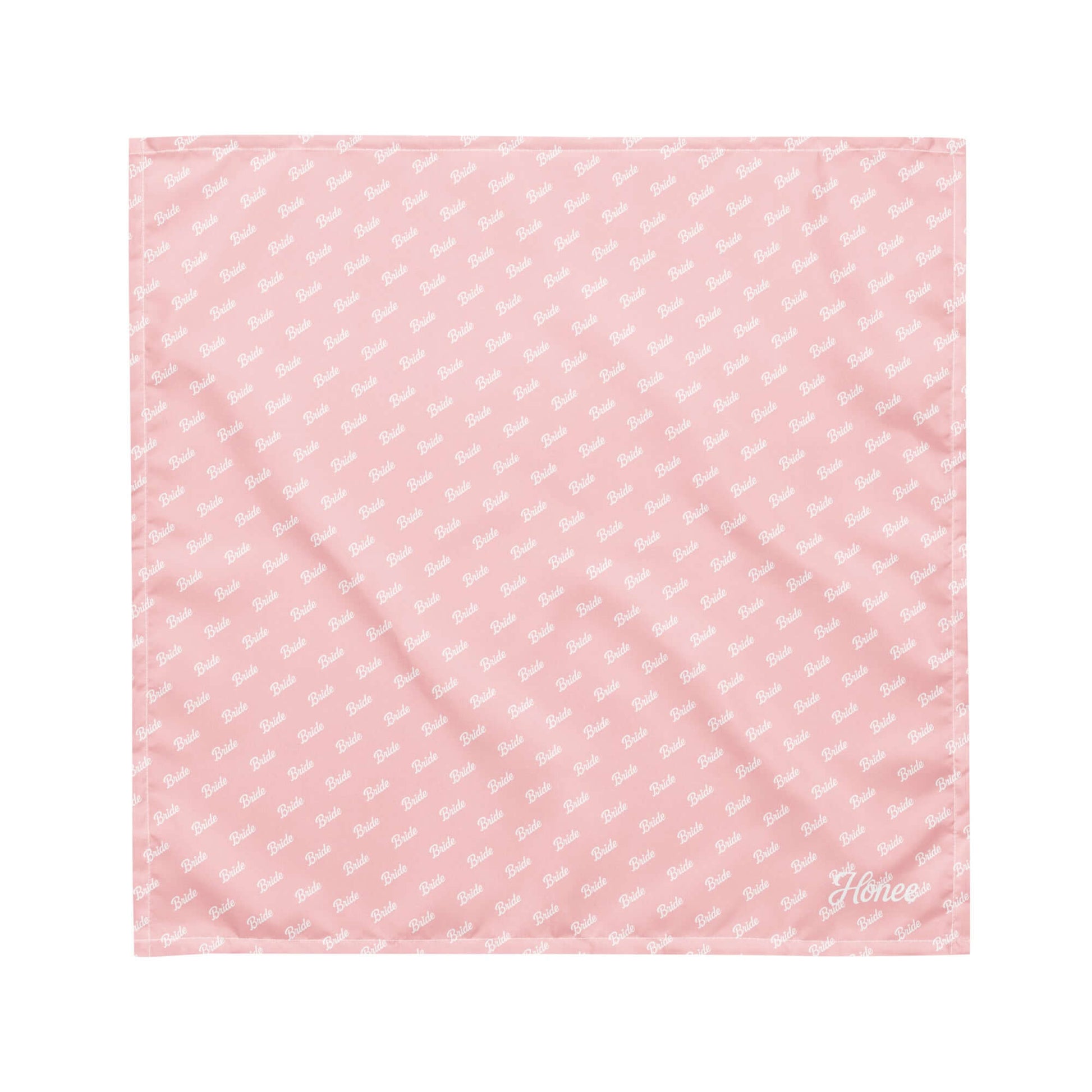 Pink bandana with all-over 'Bride' print, perfect accessory for bridal occasions.