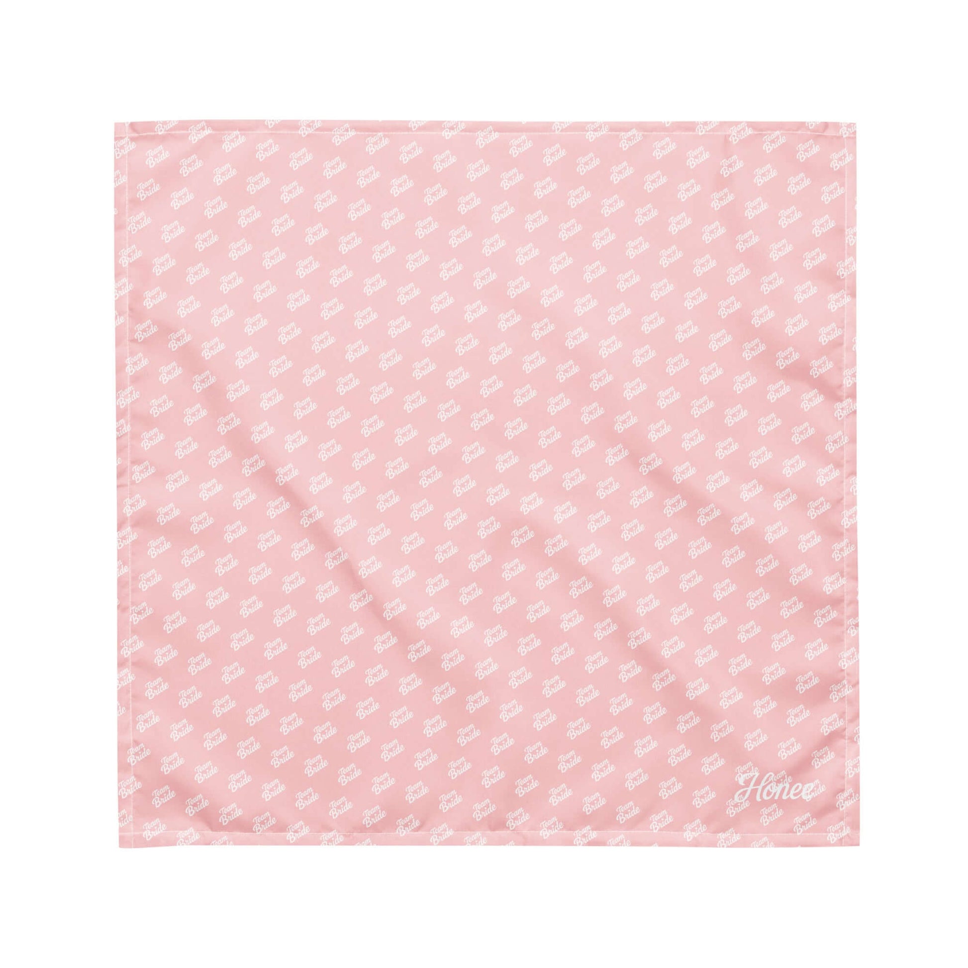 Pink bandana with all-over 'Team Bride' print, perfect accessory for bachelorette celebrations.