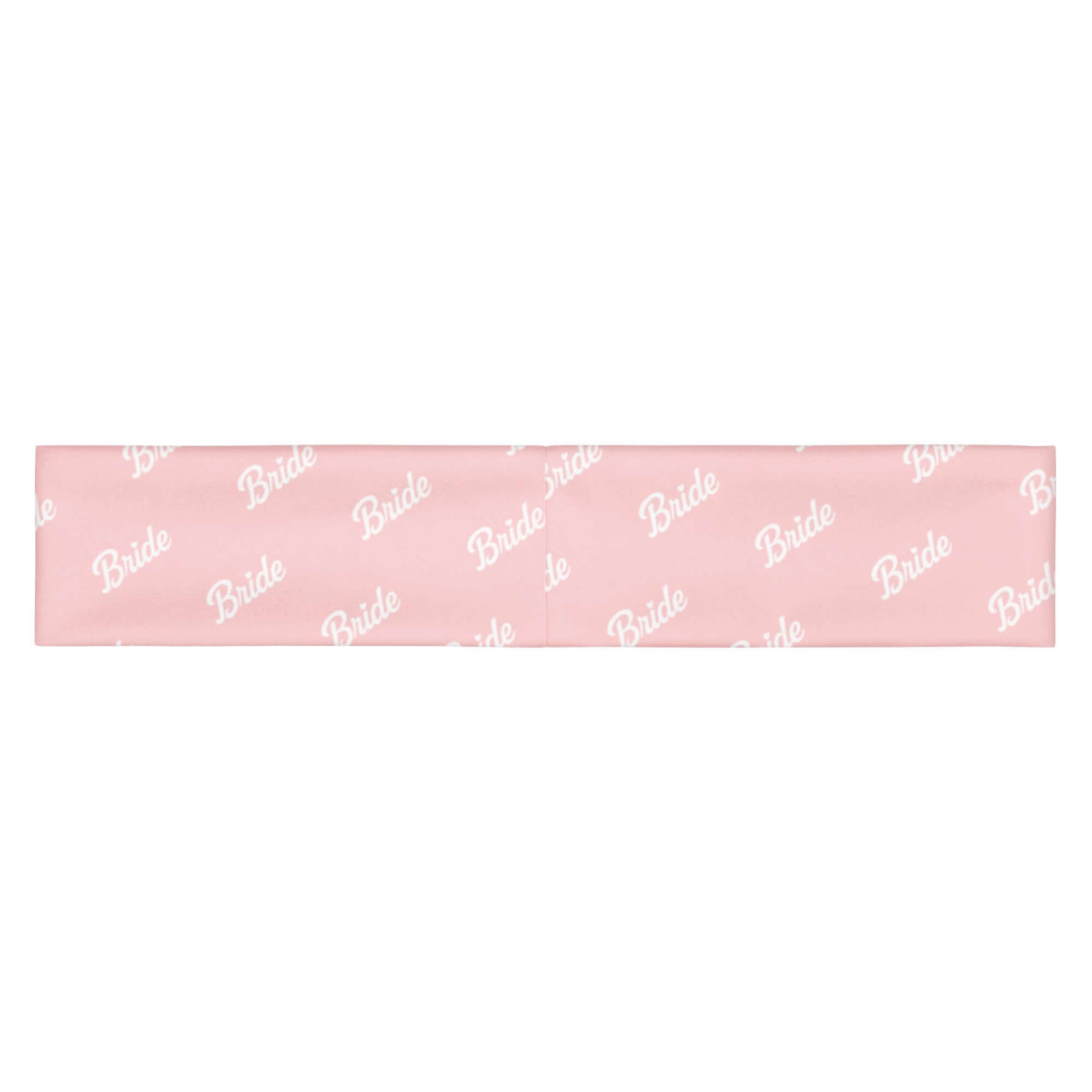 Fascia rosa per capelli con scritta 'Bride', ideale per momenti eleganti e attività relax pre-matrimonio.