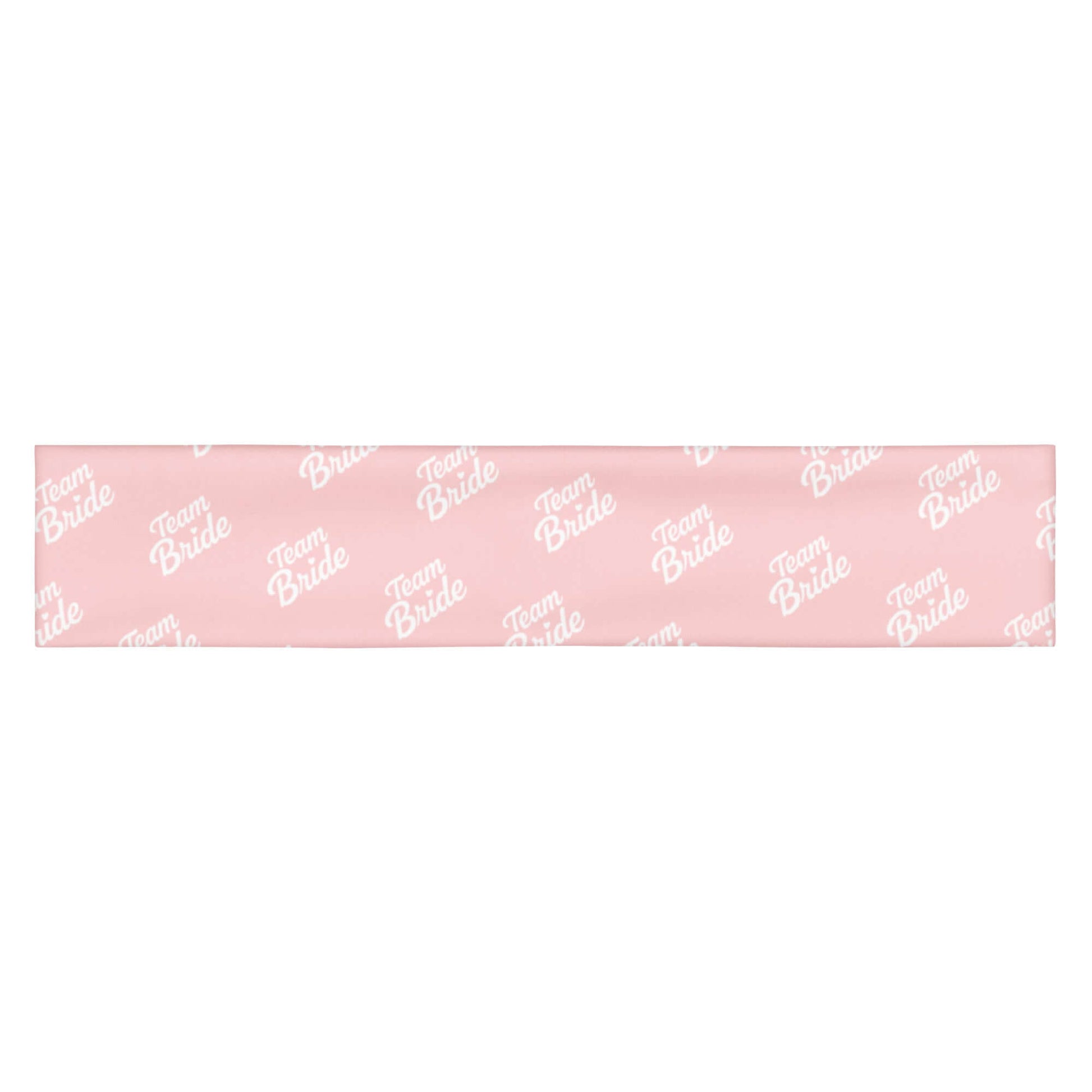 Fascia per capelli rosa con scritta bianca 'Team Bride' per eventi speciali e bridal kit.