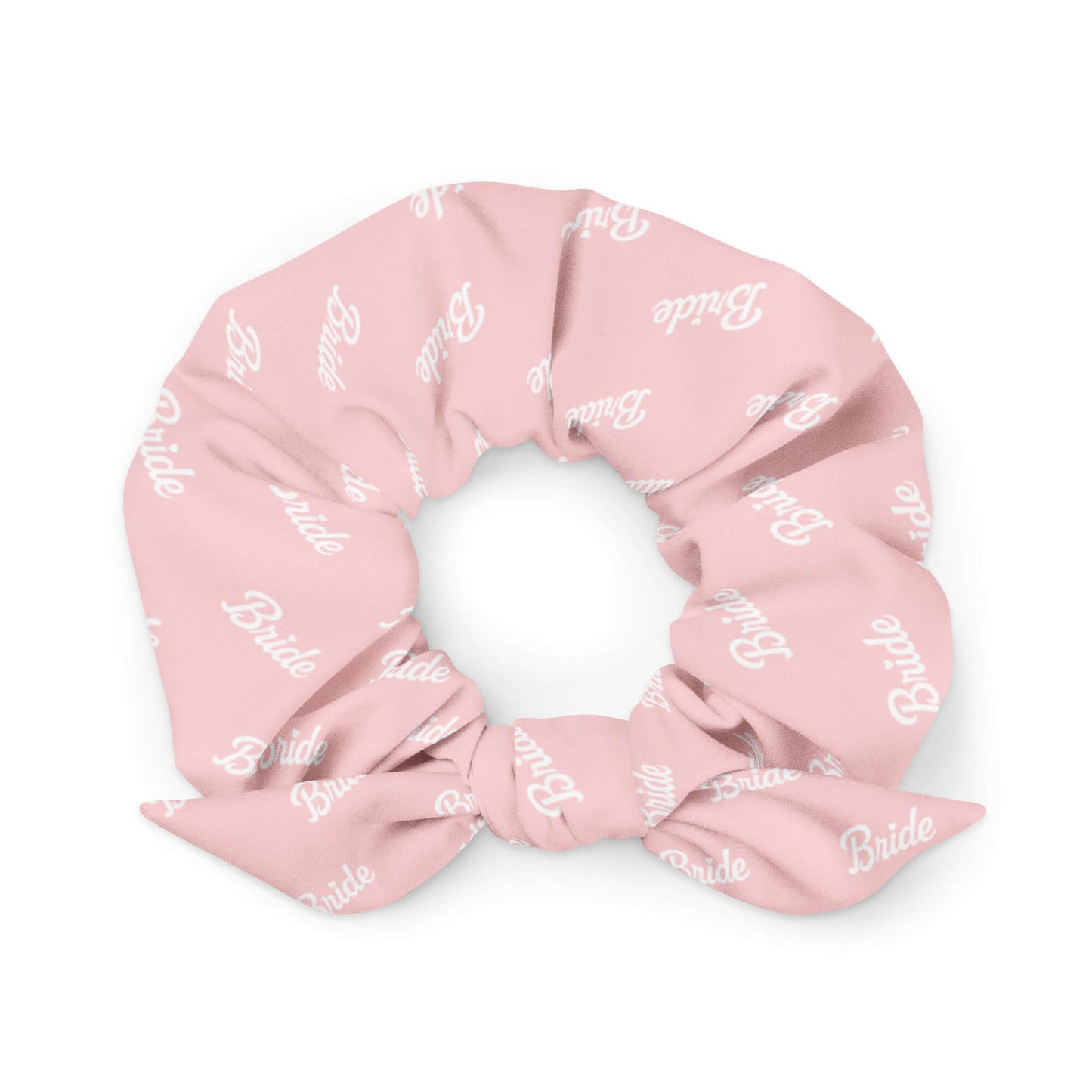 Scrunchie rosa in tessuto ecosostenibile con stampa 'Bride', accessorio elegante per spose.