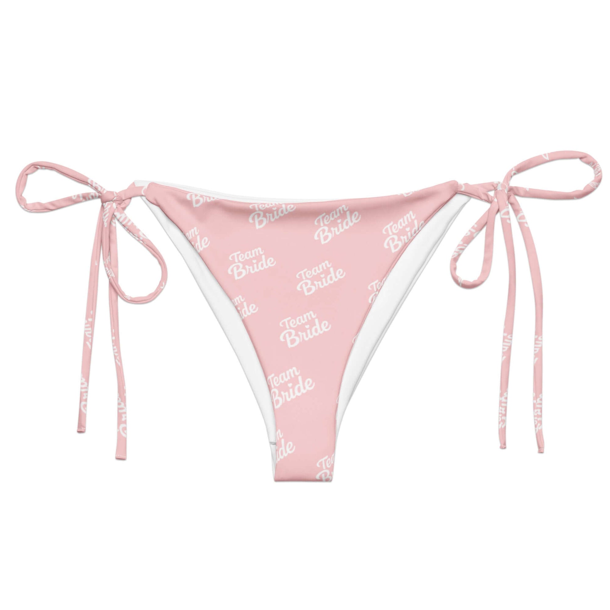 Slip bikini rosa con scritta 'Team Bride' in bianco e lacci, ideale per festeggiare l'addio al nubilato.