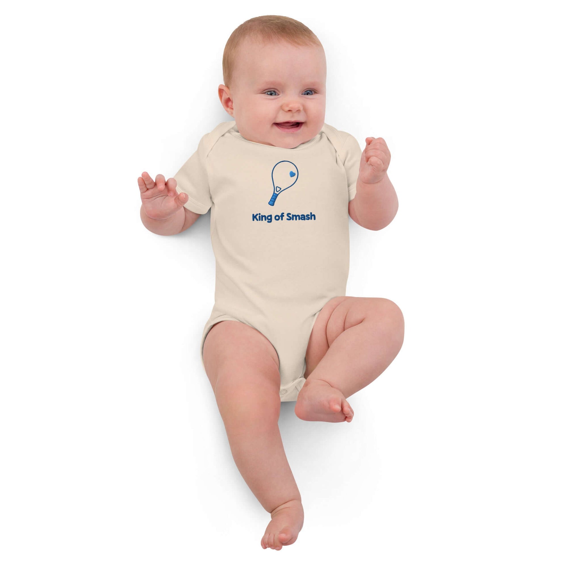 Body neonato personalizzato 'King of Smash' in cotone organico, ideale per piccoli atleti e fan del padel.