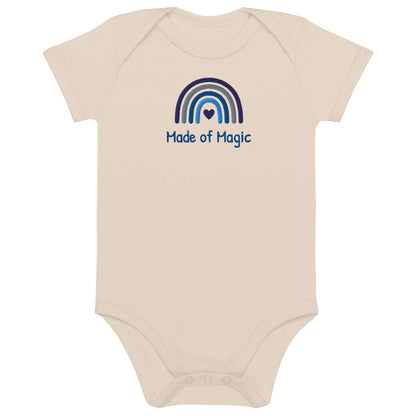 Body neonato personalizzato con arcobaleno e scritta 'Made of Magic', in cotone organico per bimbo.