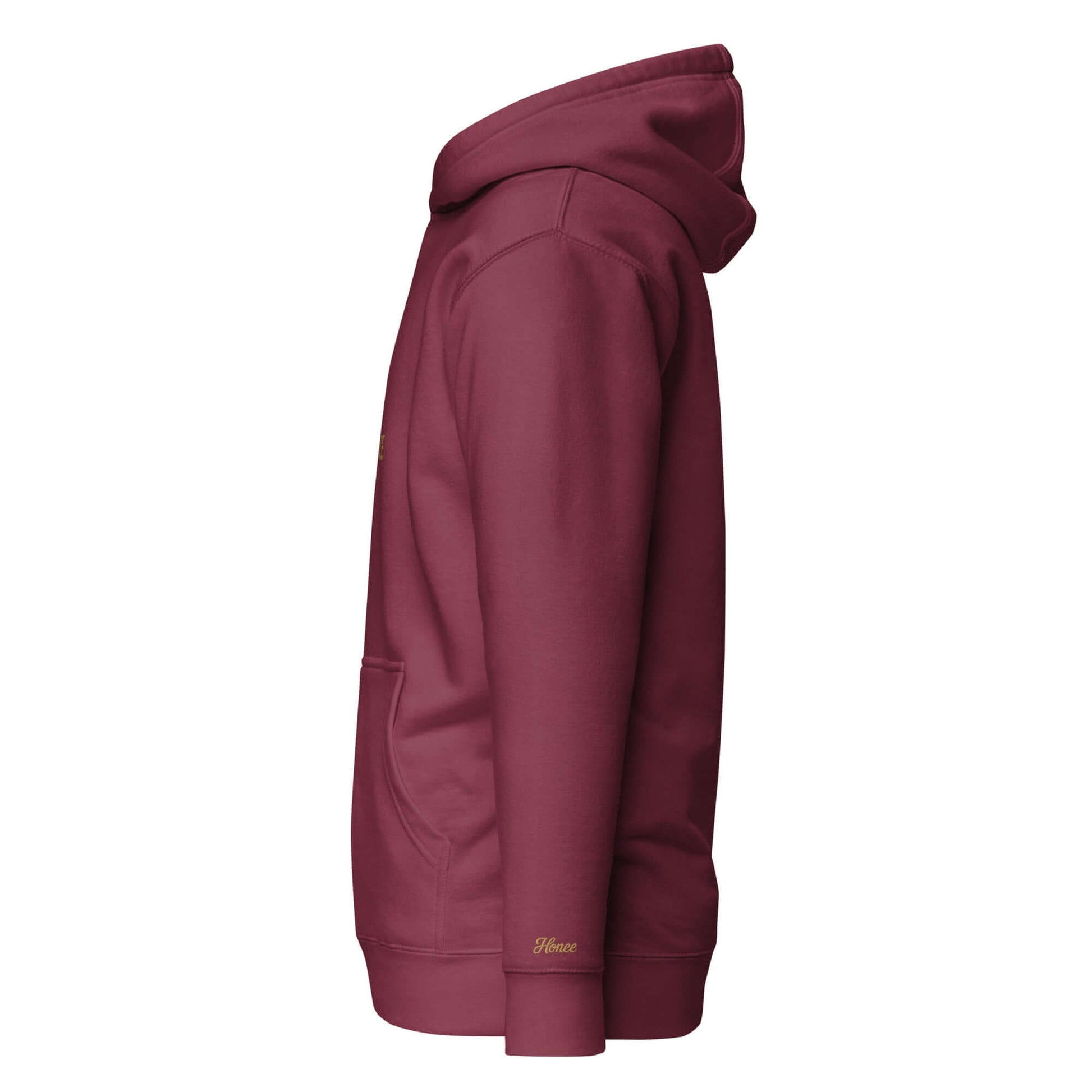 Felpa natale ricamata in cotone, mostra il profilo laterale, colore bordeaux con cappuccio e tasca frontale.