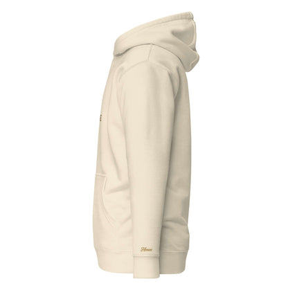 Felpa natale ricamata beige vista laterale, con cappuccio e tasca frontale, ideale per look streetwear.