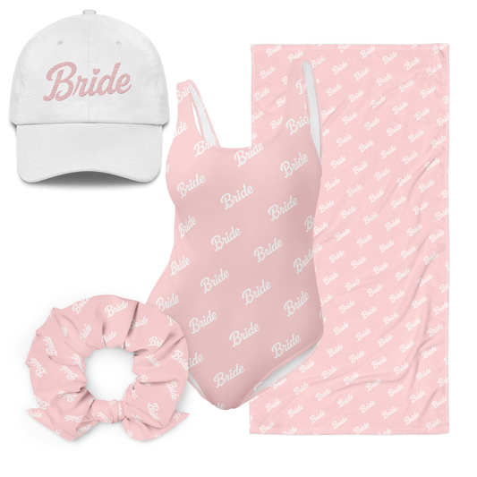 Set Beach Bride: cappello, costume, scrunchie e telo mare per un pre-wedding elegante. Collezione Groom World.