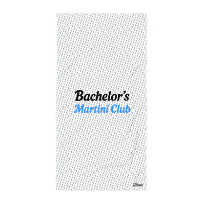 Telo mare addio al celibato con pattern coppe Martini e scritta 'Bachelor’s Martini Club' in bianco e blu.