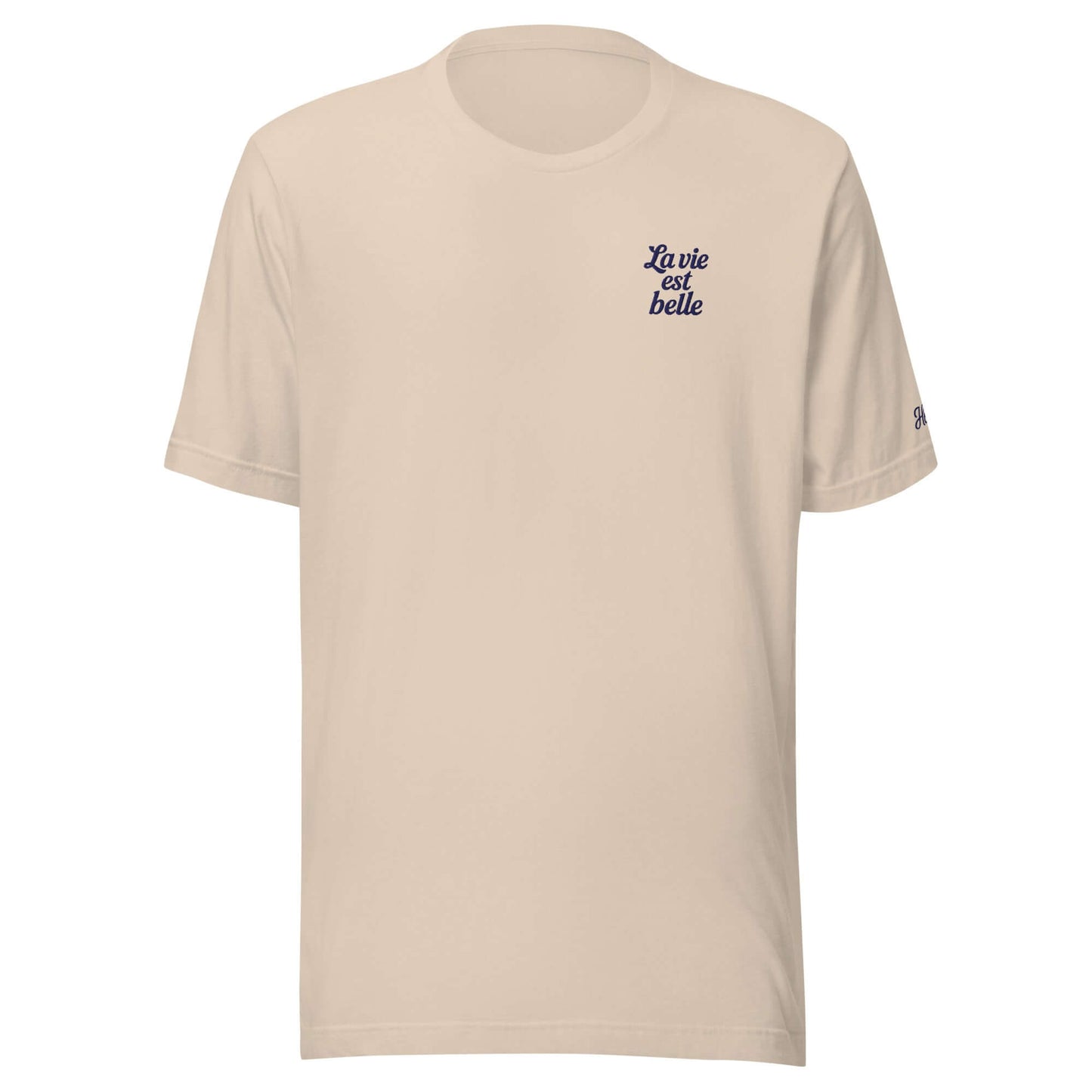 T-shirt da donna beige con ricamo 'La vie est belle', ideale per viaggi e look estivi.