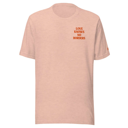 Maglietta ricamata da donna Las Vegas con scritta "Love Knows No Borders" in arancione su sfondo rosa.
